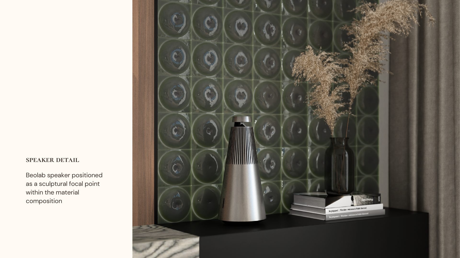 Close-up of the Bang & Olufsen Beolab speaker against a dark green glazed ceramic tile wall in the Sound & Space project